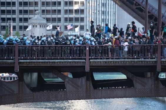 Chicago Police officers guard Trump Tower in River North on May 30, 2020 as protests occurred downtown Chicago for the second day and night in a row following George Floyd's death in Minneapolis earlier this week. | Colin Boyle/Block Club Chicago